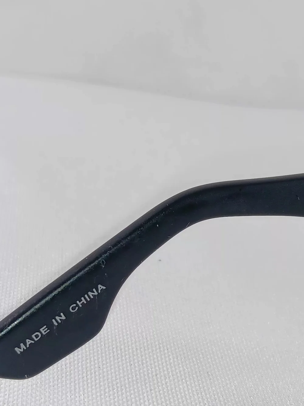McQ by Alexander McQueen Sunglasses Translucent Black Frames Minimalist Preppy